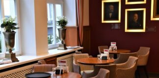 7 Cafe Terunik di Kota Banjar brown wooden table with chairs