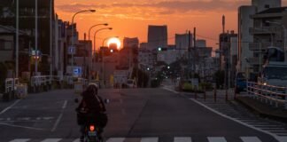 Sekolah Pagi Buta: Gagasan Populis Tanpa Landasan Akademik? a person riding a motorcycle down a street